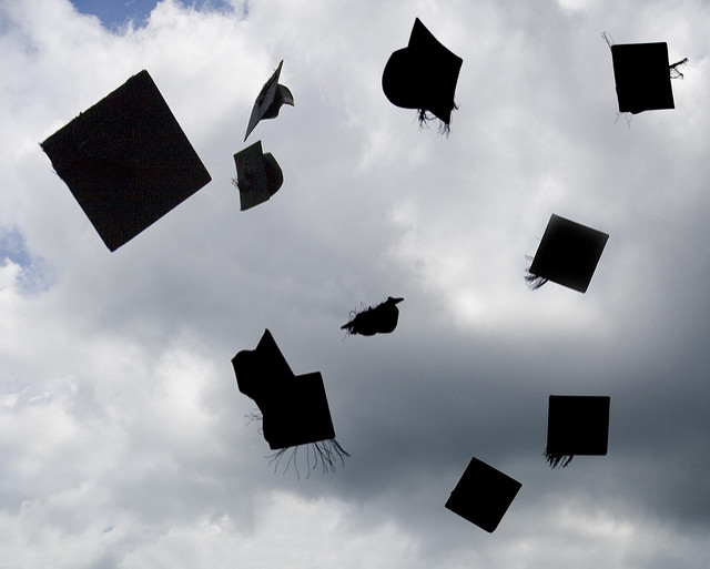 Graduation hats in the air