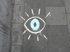 street graffiti showing an eye