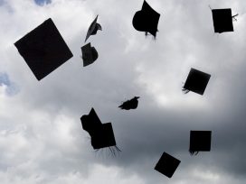 Graduation hats in the air